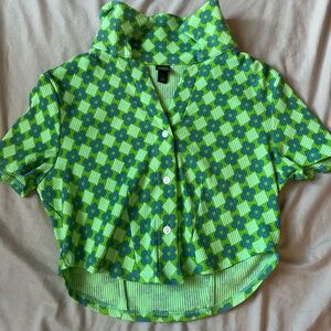 Buttoned up green and flowery tee with collar